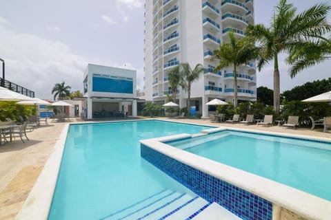 Property building, Day, Pool view, Swimming pool, sunbed