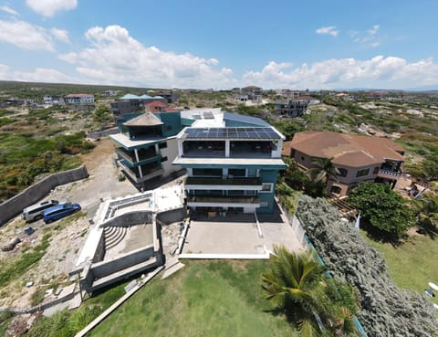 Property building, Day, Neighbourhood, Natural landscape, Bird's eye view, Street view, Location, Parking