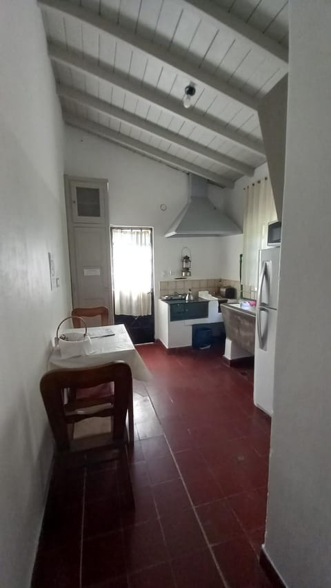 Living room, Photo of the whole room, Seating area, Garden view, oven, storage, stove, kitchen