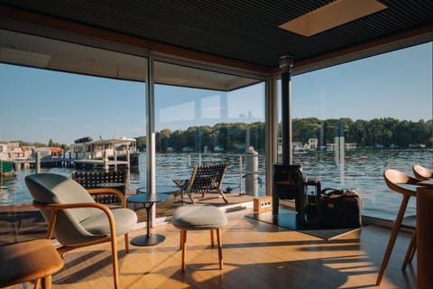 View (from property/room), Living room, Seating area, Lake view, River view