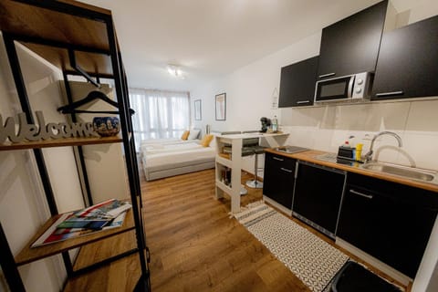 Kitchen or kitchenette, Photo of the whole room, Dining area, Bedroom, stove