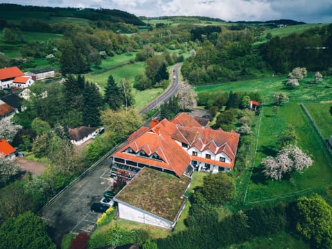 Property building, Spring, Day, Natural landscape, Bird's eye view, View (from property/room), Mountain view