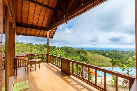 View (from property/room), Balcony/Terrace, Seating area, Mountain view, Pool view, Sea view