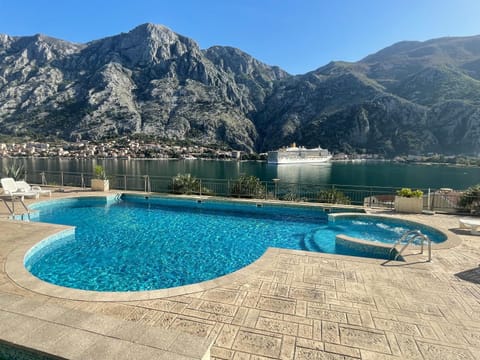 Nearby landmark, Day, Natural landscape, Mountain view, Pool view, Swimming pool, sunbed