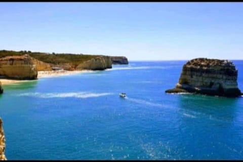 Nearby landmark, Day, Natural landscape, Beach