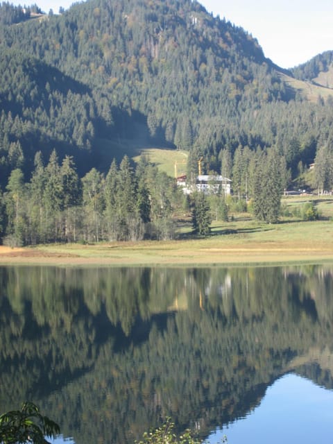 Property building, Spring, Day, Natural landscape, Lake view, Mountain view, Seasons