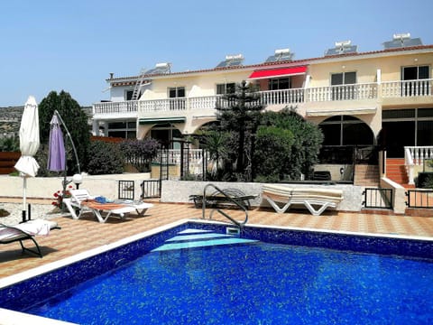 Property building, Patio, Pool view, Swimming pool, Swimming pool, sunbed