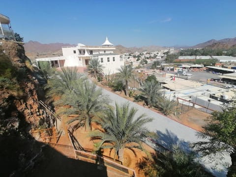 Property building, Day, Natural landscape, Parking