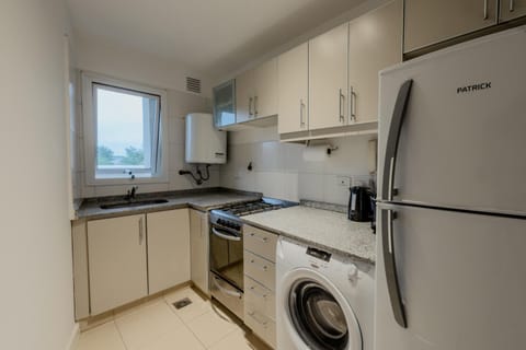 Kitchen or kitchenette, washing machine