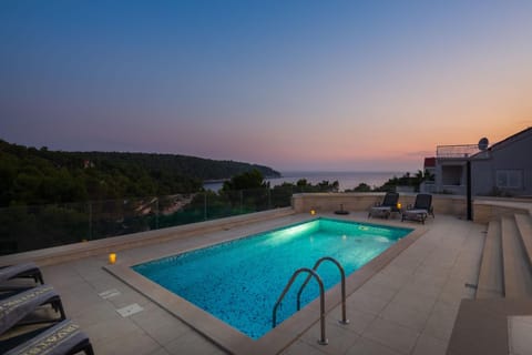 View (from property/room), Swimming pool, Sunset, sunbed