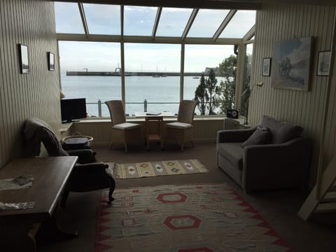 Natural landscape, Living room, Seating area, Sea view