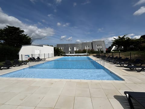 Property building, Living room, Swimming pool