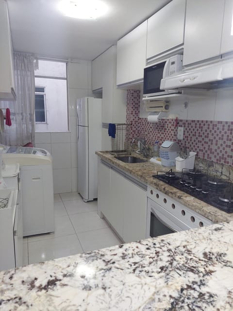 Kitchen or kitchenette, minibar, stove, laundry, washing machine