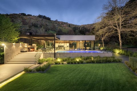 Property building, Patio, Night, Natural landscape, Garden, Garden, Garden view, Mountain view, Pool view, Swimming pool