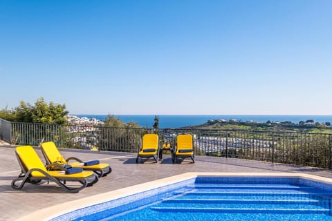 Patio, Pool view, Sea view, Swimming pool, sunbed