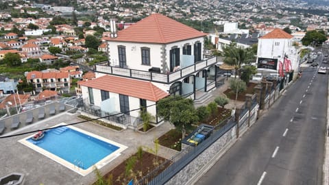 Property building, Natural landscape, Bird's eye view, Street view, Swimming pool, Location