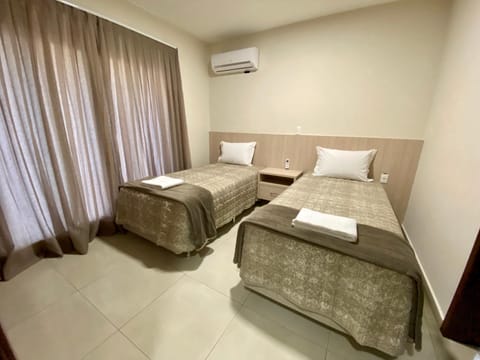 Bed, Photo of the whole room, Bedroom, towels, air conditioner