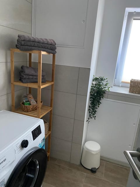 Bathroom, towels, washing machine