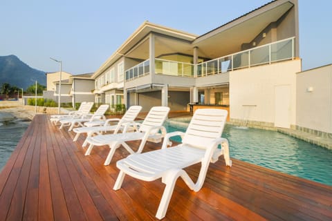 Property building, Day, Pool view, Swimming pool, sunbed