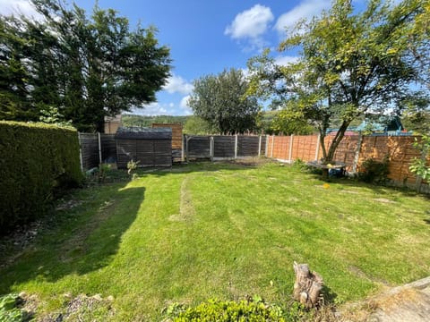 Rawtenstall bungalow. Steam train passes garden. House in Rossendale