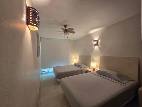 Relaxing ground floor 2 bed 2 bath appartment with pool walking distance from beach Apartment in Zihuatanejo