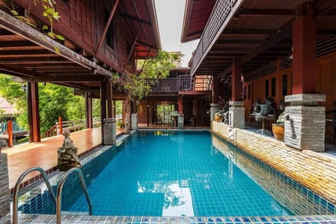 Property building, Patio, Pool view, Swimming pool