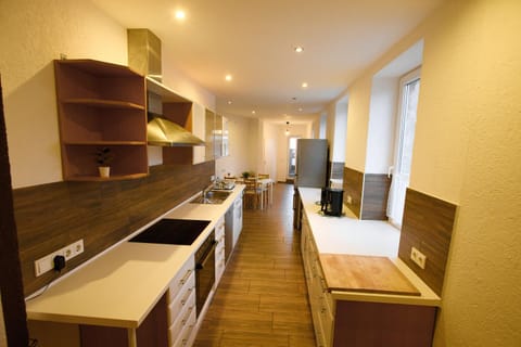 Kitchen or kitchenette, dishwasher, oven, stove