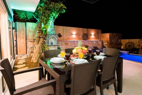 Patio, Seating area, Dining area, Pool view, Swimming pool