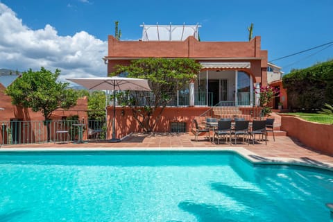 Property building, Living room, Swimming pool