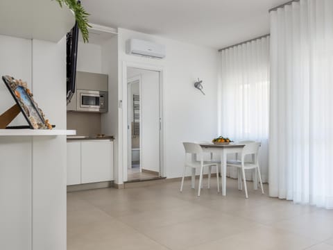 Dining area, minibar, kitchen, kitchen