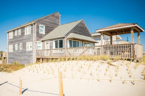 Red And Brown House in Oak Island