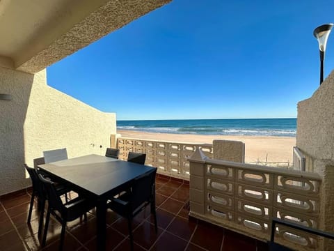 View (from property/room), Balcony/Terrace, Seating area, Dining area, Beach, Sea view