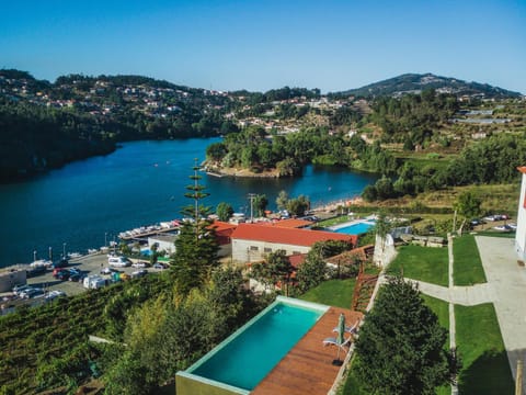 Nearby landmark, Spring, Day, Neighbourhood, Natural landscape, River view, Swimming pool