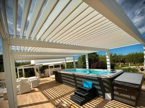 Patio, Natural landscape, Pool view, Swimming pool, sunbed