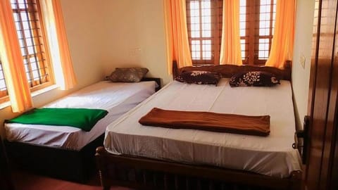 Texas guest house 4 bed Rooms Apartment in Thiruvananthapuram