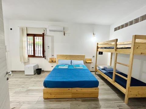 Bed, Photo of the whole room, Bedroom, bunk bed, towels, air conditioner