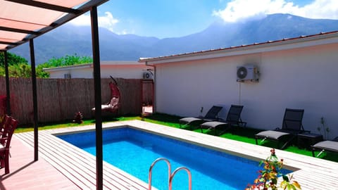 Patio, Spring, Natural landscape, Mountain view, Pool view, Swimming pool, sunbed