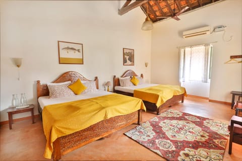 Caju Grove - The Big Yellow Goan House Bed and Breakfast in Goa, India