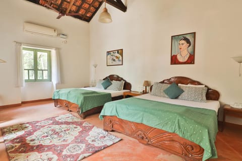 Caju Grove - The Big Yellow Goan House Bed and Breakfast in Goa, India