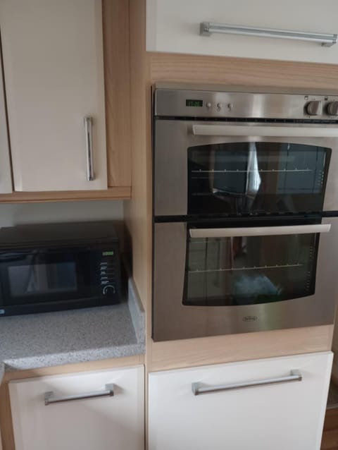 Luxury 2 bedroom caravan with large decking Close to beach Campground/
RV Resort in Towyn