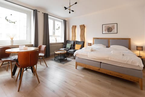 Bed, Living room, Seating area, Dining area, Bedroom