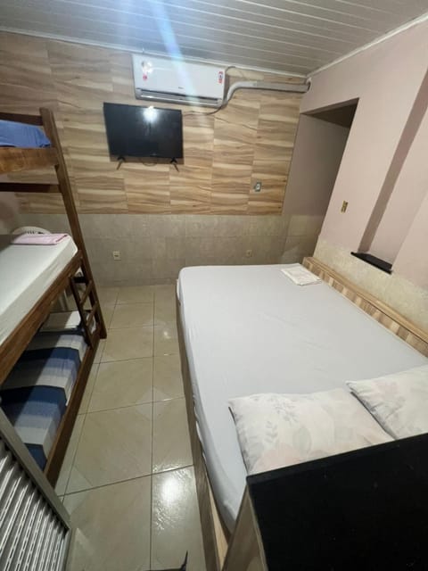 Flat na Praia de Itapuã no Terreo com AR-Condicionado - SEM TAXAS Condo in Salvador