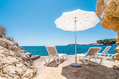 Natural landscape, Seating area, Beach, Sea view, sunbed