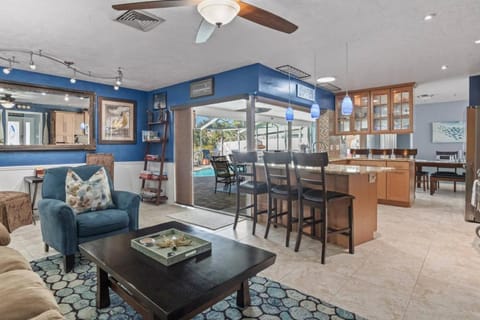 Pirates Den a 4BR Pet-Friendly Waterfront Oasis with Pool, Dock, Personal Water Boats, Fire Pit, Game Room and Bar House in Apollo Beach