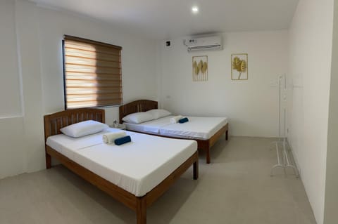 Kasamigos Guesthouse with Fast Internet Alojamiento y desayuno in Puerto Princesa