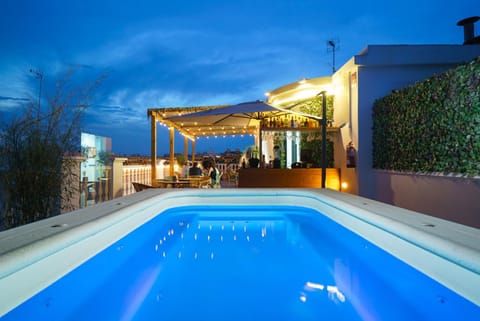 Property building, Swimming pool, Sunset