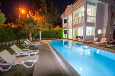 Property building, Patio, Swimming pool, sunbed