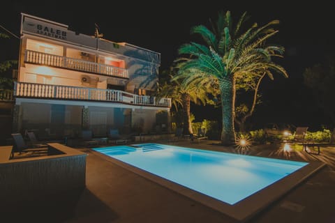 Property building, Patio, Night, View (from property/room), Balcony/Terrace, Pool view, Swimming pool, sunbed