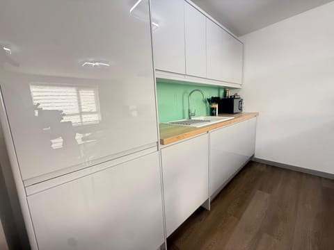 Kitchen or kitchenette, oven, stove