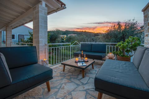 View (from property/room), Balcony/Terrace, Seating area, Sunset